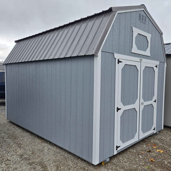 10x16 lofted barn shed, charcoal metal roof, steely gray walls, barn white trim, 7ft tall walls, double barn doors, 2x3 window, two 4ft lofts, workbench, 60psf snow load, engineer certified.