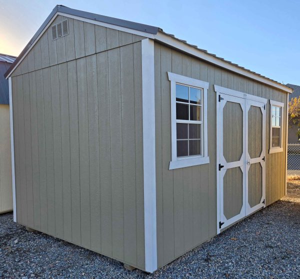 10x16 Side Utility, burnished slate metal roof, hardware (clay) walls, barn white trim, 8ft tall walls, double barn doors, two 2x3 windows, 60psf snow load, engineer certified.