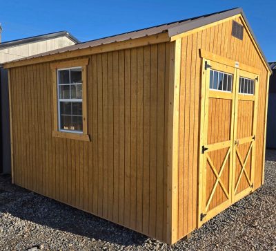 10x12 utility shed, burnished slate metal roof, pressure treated T1-11 siding water sealed, 7ft tall walls, double barn doors with windows, three 2x3 windows, 5/8 tongue and groove plywood floor, 60psf snow load, engineer certified.