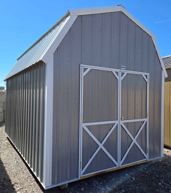 10x16 lofted barn, 7ft tall walls, brilliant white metal roof, OSB sheathing, pewter cast vertical metal siding, brilliant white metal trim, double barn doors, two 4ft lofts, wooden floor, 60lb snow load, engineer certified.
