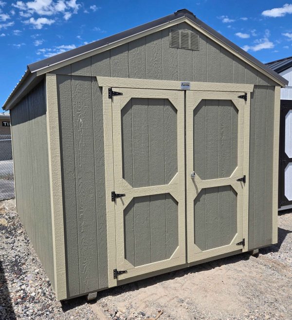 10x12 utility shed, charcoal metal roof, rosemary green walls, crewel tan trim, 7ft walls, double barn doors, wood floor, 60lb snow load, engineer certified.