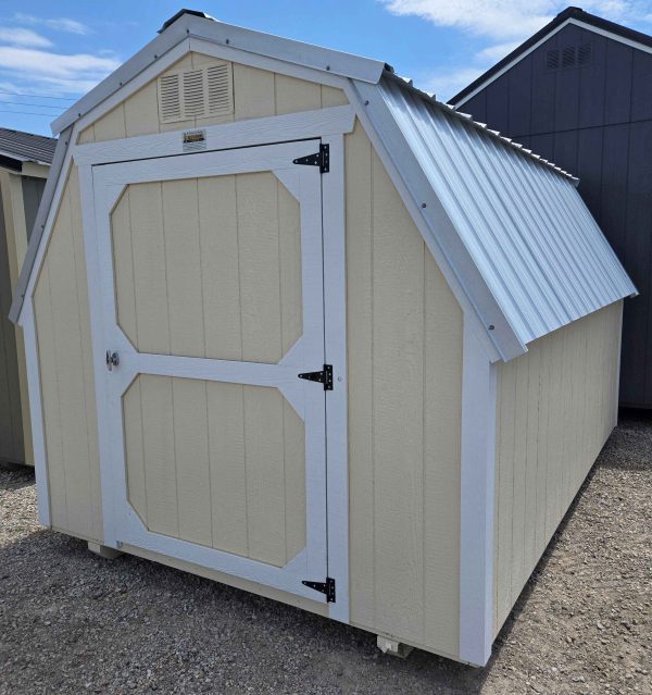 8x12 barn, silver metal roof, eaglet beige walls, barn white trim, 4ft walls, single barn door, wood floor, 30lb snow load, engineer certified.