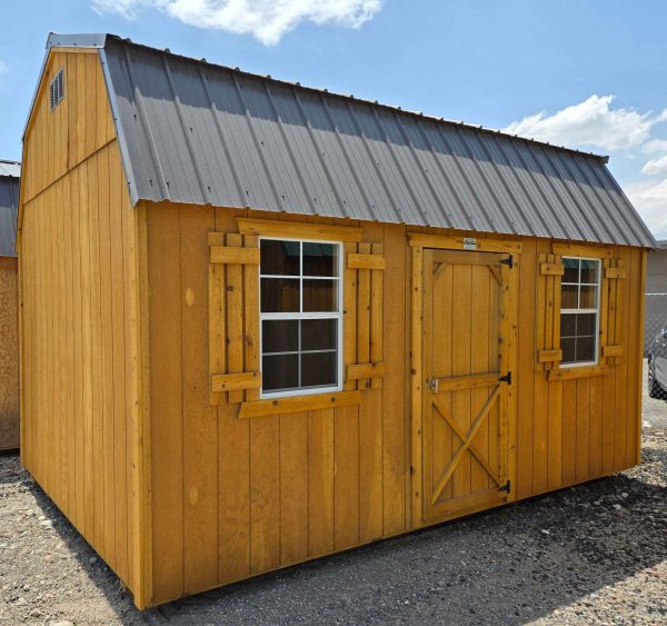 10x16 side lofted barn shed, burnished slate metal roof, 7ft walls, T1-11 fir siding water sealed, 3ft single barn door, two 2x3 windows with shutters, two 4ft lofts, wood floor, 60lb snow load, engineer certified.