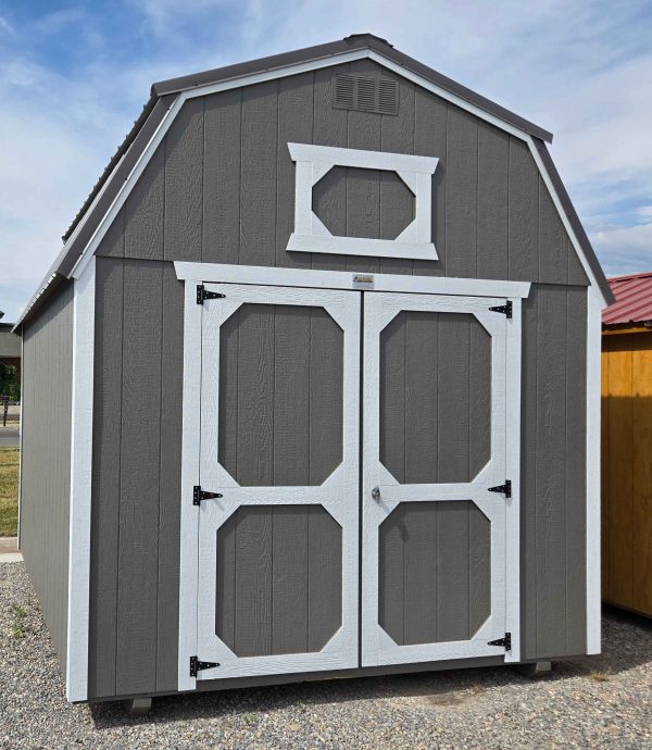 10x12 lofted barn shed, charcoal metal roof, 7ft walls, double barn doors, peppercorn walls, barn white trim, two 4ft lofts, wood floor, 60lb snow load, engineer certified.
