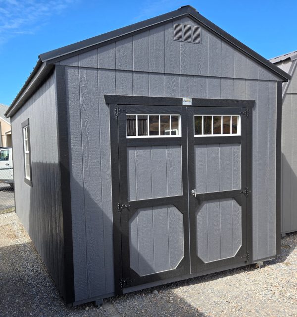 10x16 utility shed, black metal roof, peppercorn walls, tricorn black trim, 8ft tall walls, double barn doors with windows, two 2' x 3' windows, wooden floor, 60lb snow load, engineer certified.