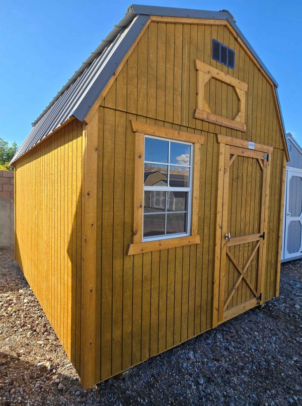 10x12 lofted barn, charcoal metal roof, pressure treated siding-water sealed, 7ft tall walls, 3ft single barn door, 2x3 white window, two 4ft lofts, wooden floor, 60lb snow load, engineer certified.