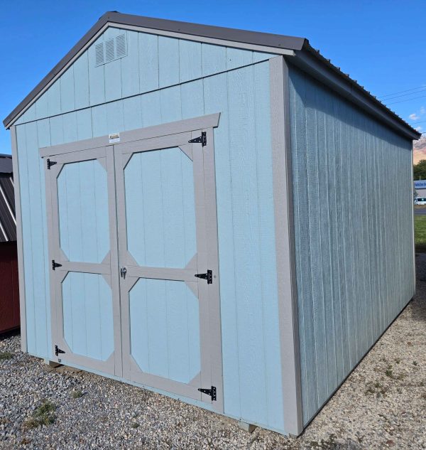 10x16 utility, charcoal metal roof, breezy (light blue) walls, pewter cast trim, 8ft tall walls, wooden floor, 60lb snow load, engineer certified.