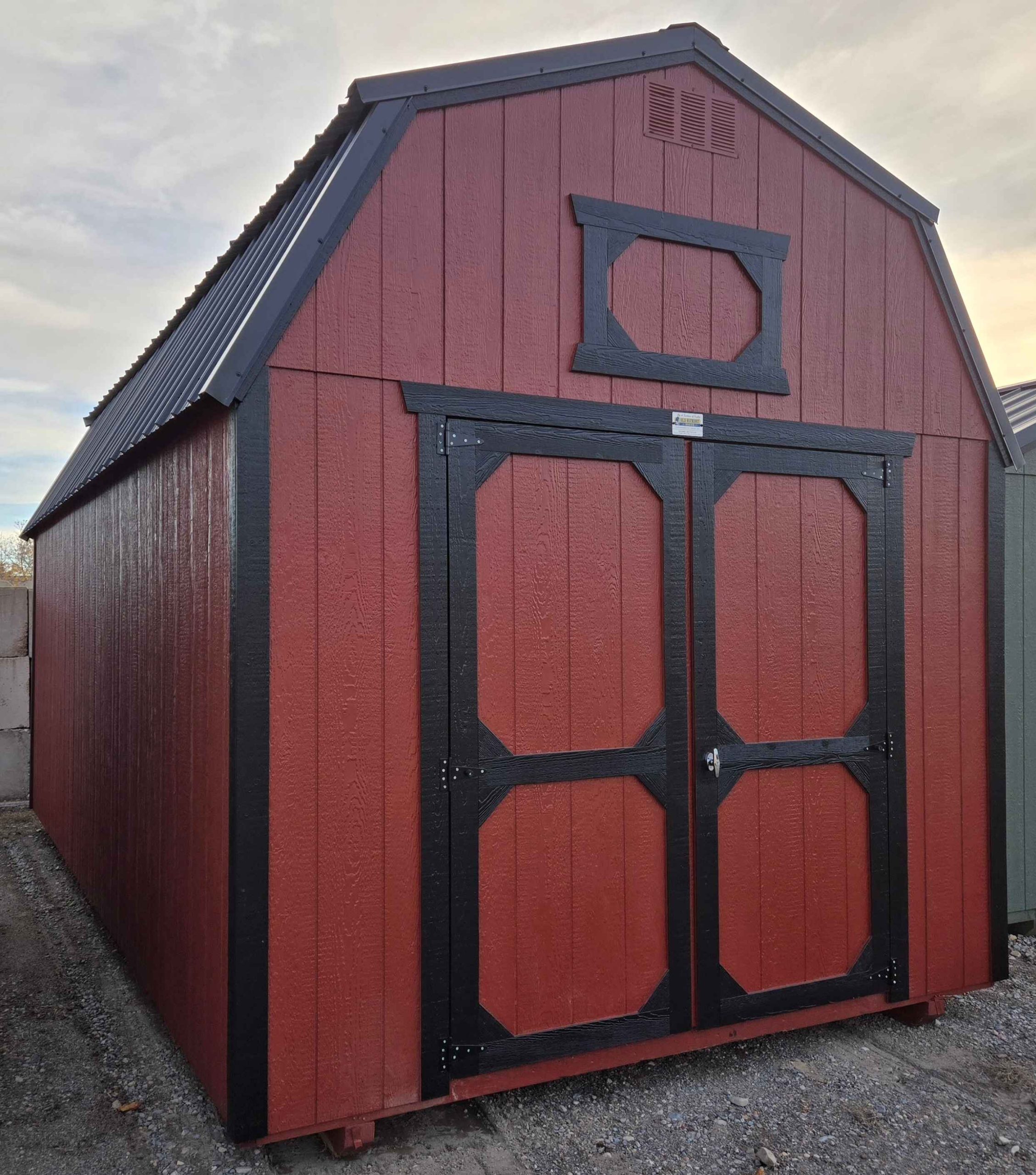 10x20 lofted barn shed, black metal roof, rustic red walls, tricorn black trim, 7ft walls, two 4ft lofts, double barn doors, wooden floor, 60lb snow load, engineer certified.