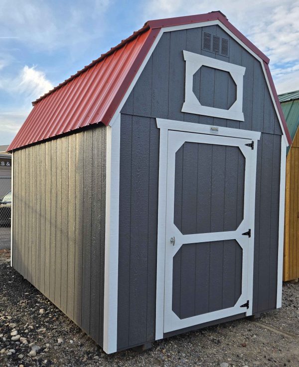 8x12 lofted barn, rustic red metal roof, peppercorn color walls, barn white trim, 7ft tall walls, 4ft single barn door, two 4ft lofts, wood floor, 60lb snow load, engineer certified.