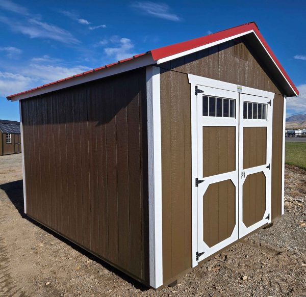 10x12 utility shed, 7ft walls, rustic red metal roof, dark clove walls, barn white trim, double barn doors with windows, shelving across back wall, wood floor, 60lb snow load, engineer certified.