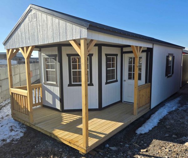 12x28 deluxe playhouse utility shed, black metal roof, five 2x3 windows, 9 lite window house door, wooden floor, 8ft tall walls, 60lb snow load, engineer certified.