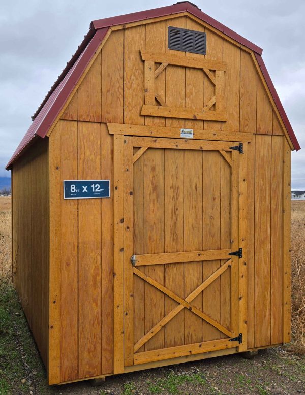 8x12 lofted barn, rustic red metal roof, fir siding water sealed, 7ft tall walls, 4ft single barn door, two 4ft lofts, wood floor, 60lb snow load, engineer certified.