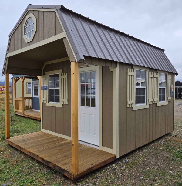 10x16 playhouse lofted barn shed with 4ft porch and 9-lite window house door, burnished slate metal roof, thatch brown walls, crewel tan trim, 7ft tall walls, five 2x3 windows with trim, front 4ft loft with octagon window, back 4ft loft with 24"x27" window, 60lb snow load, engineer certified.