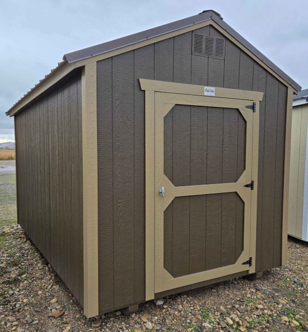 8x12 utility shed, burnished slate metal roof, dark clove walls, crewel tan trim, 6ft 3in walls, single barn door, wood floor, 60lb snow load, engineer certified.