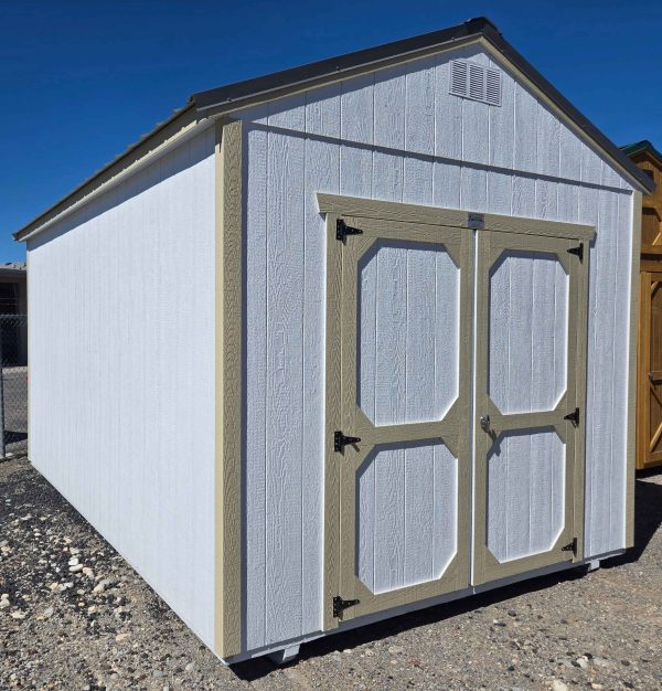 10x16 utility shed, charcoal metal roof, barn white walls, crewel tan trim, 8ft tall walls, double barn doors, wood floor, 60lb snow load, engineer certified.