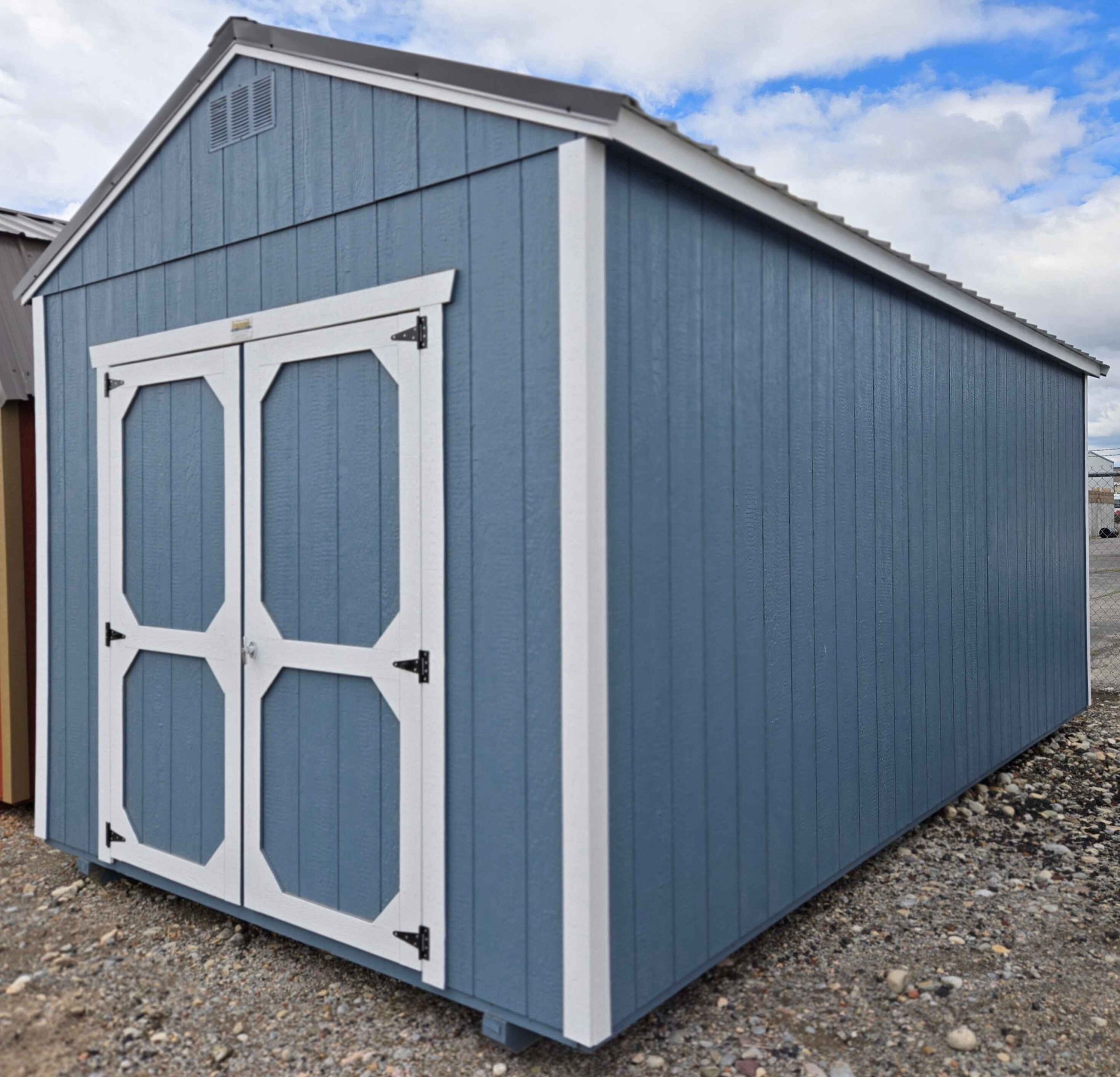 10x20 utility shed, black metal roof, smokey blue walls, barn white trim, 8ft tall walls, wooden floor, 60lb snow load, engineer certified.