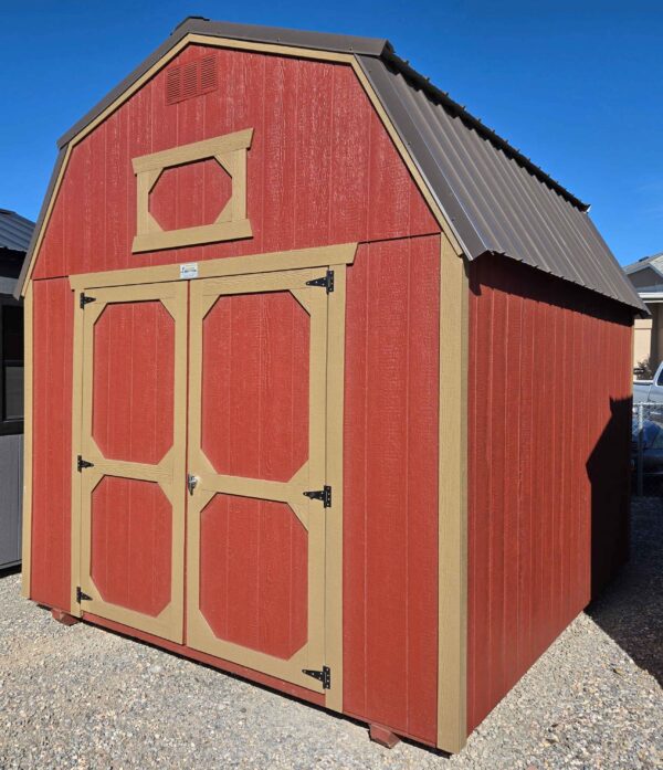 10x12 lofted barn shed, burnished slate metal roof, 7ft walls, double barn doors, rustic red walls, thatch brown trim, two 4ft lofts, wood floor, 60lb snow load, engineer certified.