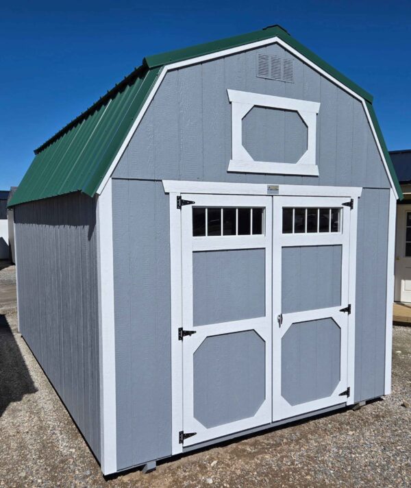 10x16 lofted barn shed, hunter green metal roof, steely gray walls, barn white trim, 7ft walls, two 4ft lofts, double barn doors with windows, 10ft 3-tier shelving, wooden floor, 60lb snow load, engineer certified.