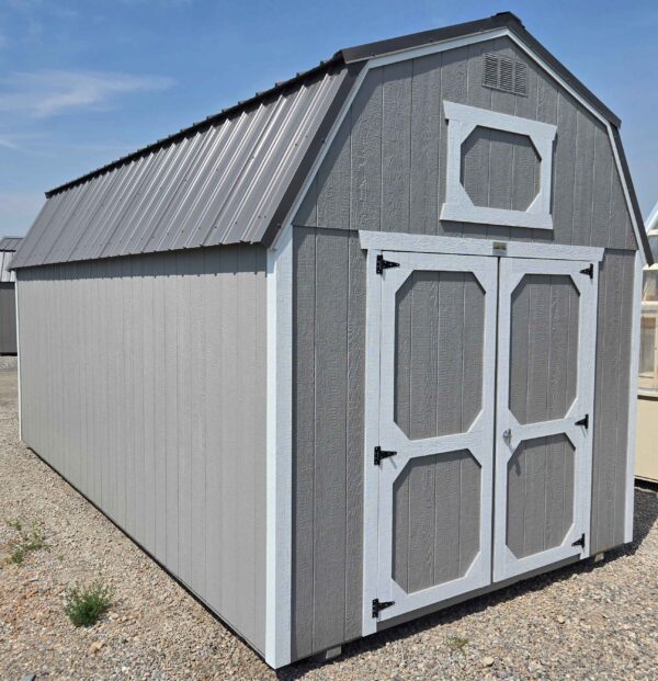 10x20 lofted barn shed, charcoal metal roof, pewter cast walls, barn white trim, 7ft walls, two 4ft lofts, wood floor, 60lb snow load, engineer certified.