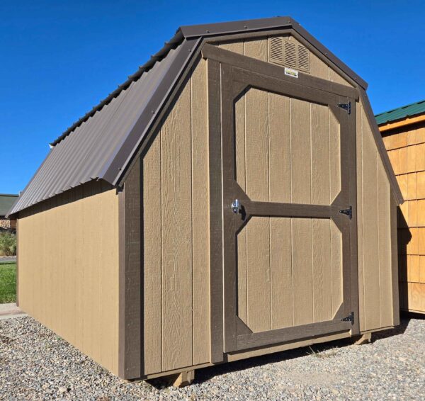 8x12 barn with no loft, burnished slate metal roof, thatch brown walls, dark clove trim, 4ft walls, single barn door, wood floor, as-is no warranty.