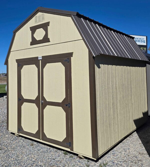 10x12 lofted barn, burnished slate metal roof, main color crewel tan, trim color dark clove, double barn doors, 7ft tall wall, two 4ft lofts, wood floor, 60psf snow load, engineer certified.