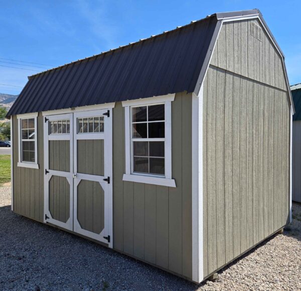 10x16 side lofted barn, burnished slate metal roof, hardware walls, barn white trim, 7ft tall walls, double barn doors with windows, two 2x3 windows, 5/8 tongue & groove plywood, two 4ft lofts, engineer certified.